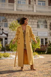 Dorothée Belted Faux-Leather Trench in Yellow