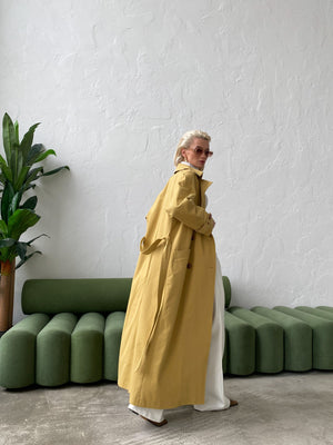 Dorothée Belted Faux-Leather Trench – Mustard